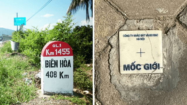 chi phí cắm mốc giải phóng mặt bằng - một mốc giới bê tông đang được cắm trên mặt đất 